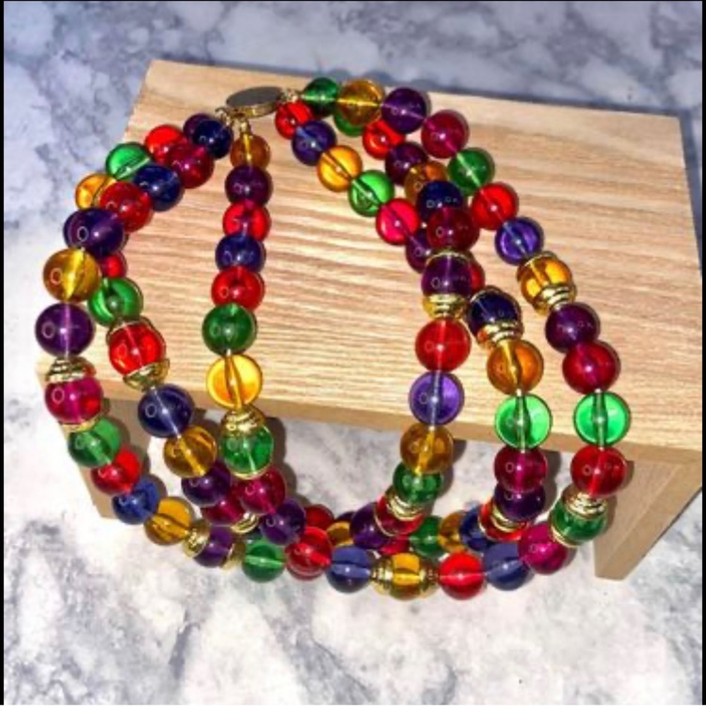 Vintage lucite three strand necklace with original tag